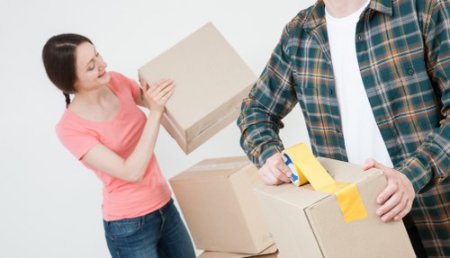 Furniture pick-up service removing a sofa in Brentcross