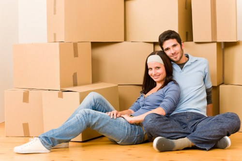 Packing boxes and furniture prepared for a Brentcross flat removal