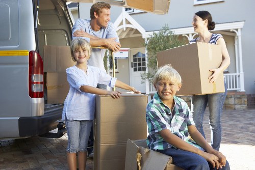Moving team handling items carefully during loading
