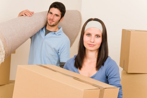 Business relocation team organising desks and office items during a Brentcross move