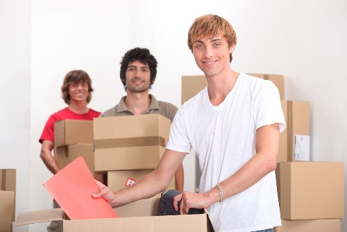 Packing supplies and labeled boxes for a Brentcross house move
